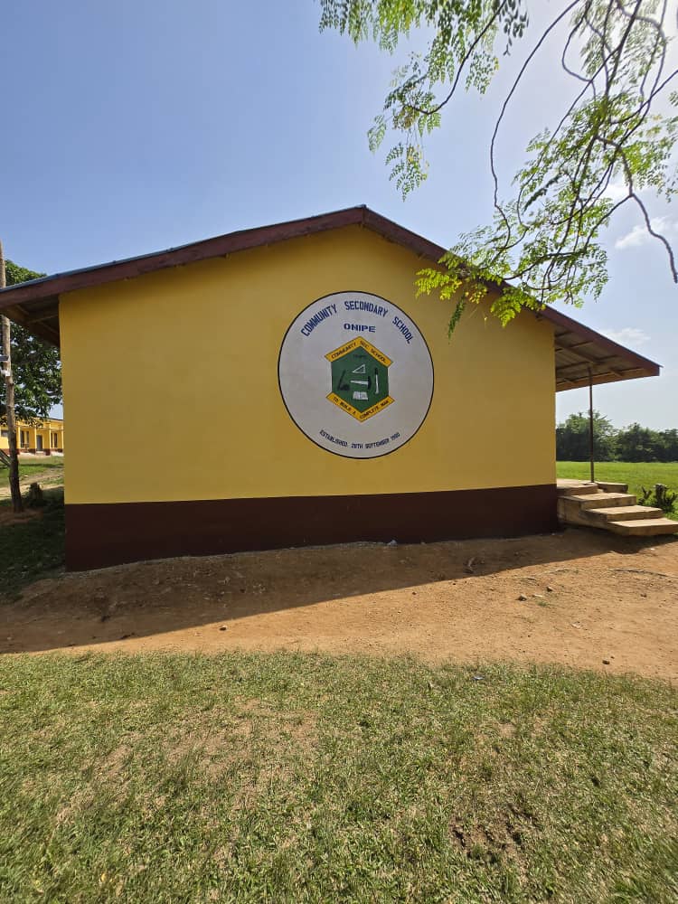 Community Secondary School Onipe sign on the school building wall